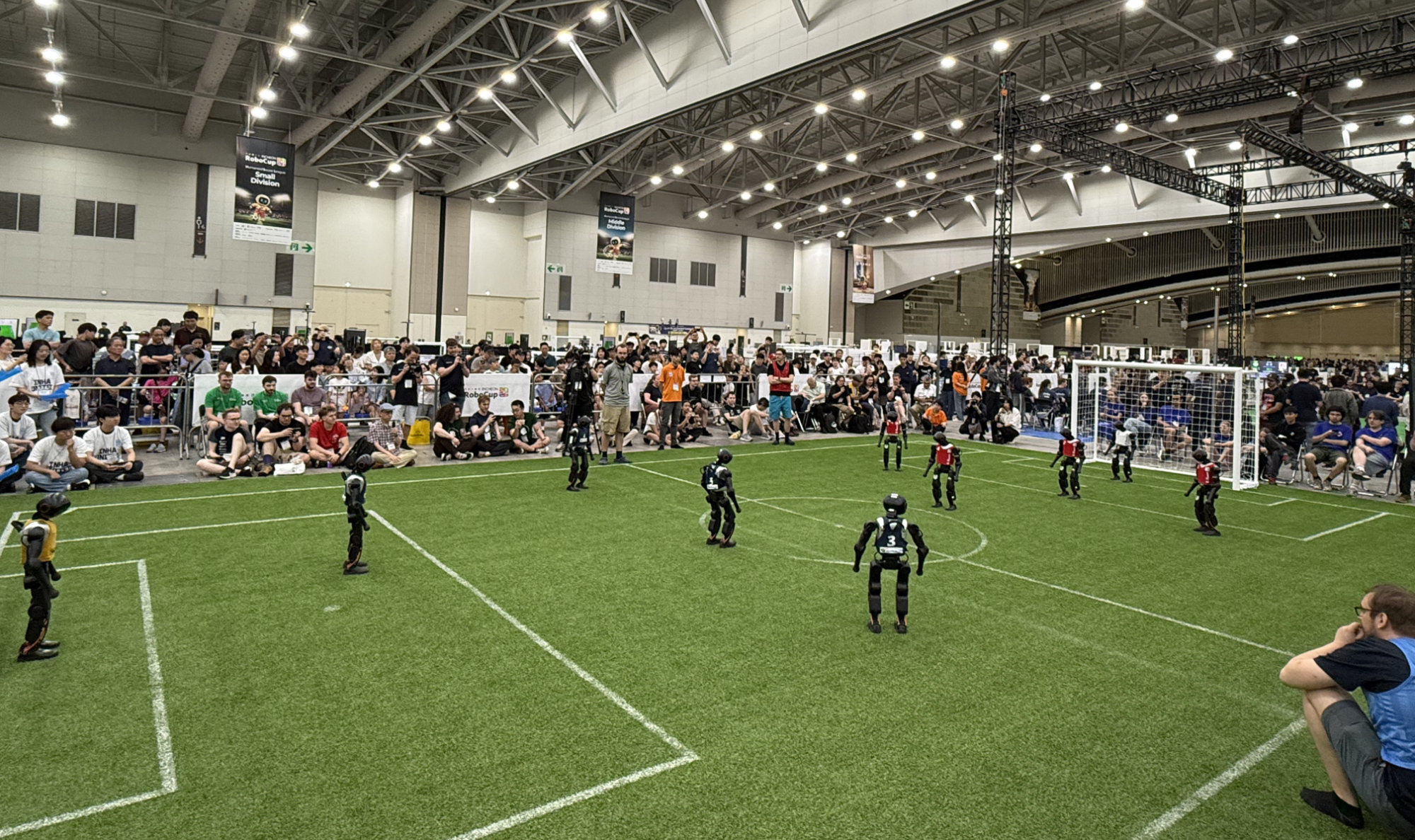Kickoff of the RoboCup Mid Division final 2026 - B-Human (red) against HTWK Robots (blue)